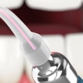 Who regulates the rules for lasers used in dentistry?